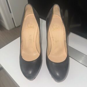 Christian Louboutin black pumps